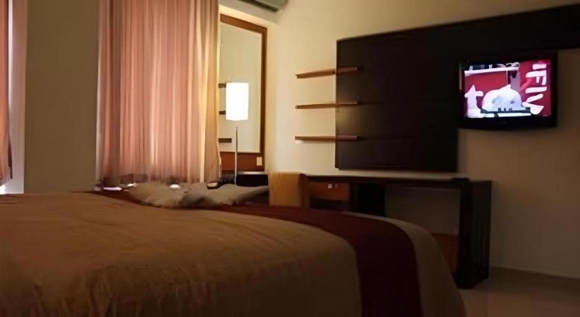 Travello Hotel Манадо Екстер'єр фото